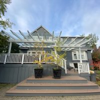 Outside home that is having outdoor patio installed