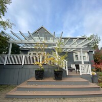 Outside home that is having outdoor patio installed