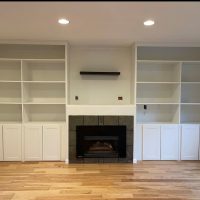 hardwood floor with wall entertainment system